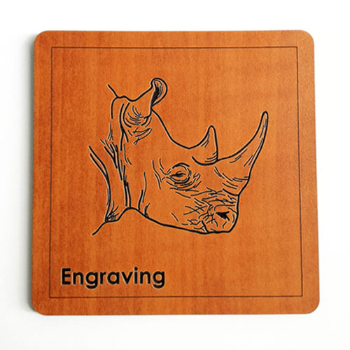 Square wooden coaster with detailed rhino face engraving – handcrafted curio item